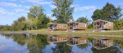 Wooden chalets overlooking the water