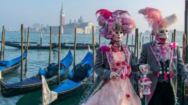 Carnival in Venice with costumes and gondolas