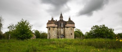Manoir de la Saucerie under a cloudy sky. Orne, France. Campsites in the Orne