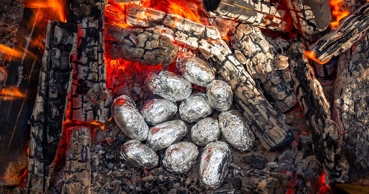 baked potatoes in campfire