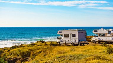 Camper rv camping on sea shore, Spain