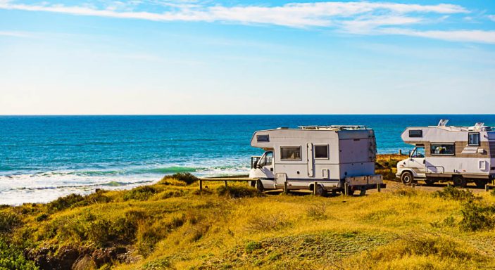 Camper rv camping on sea shore, Spain