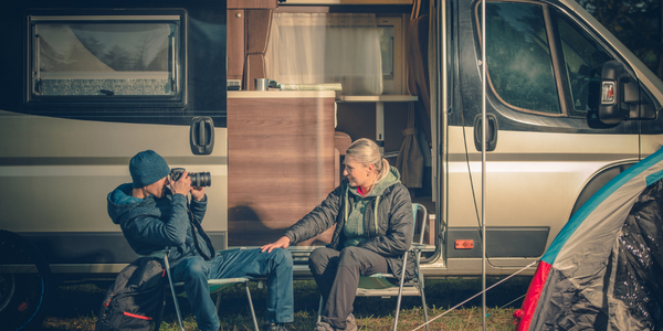 Couple enjoying a camping trip. Staying safe and well when camping