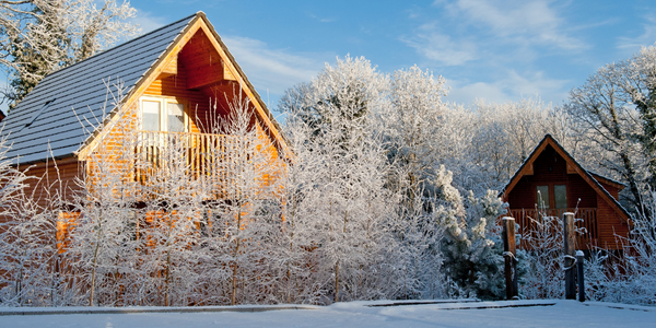 log cabin in the snow. Best accommodation for snow holidays