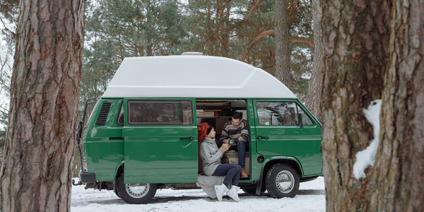 campervan in the snow. Winter camping in a motorhome