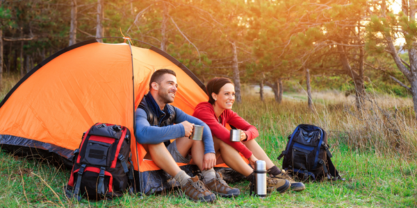 Tips for camping - couple in tent 