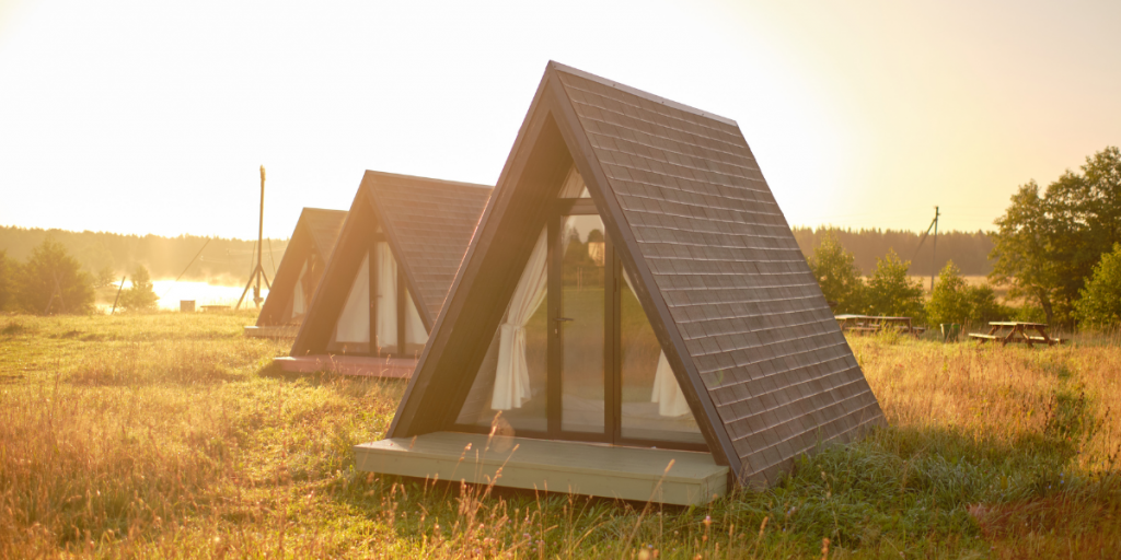 Group of glamping huts by the river