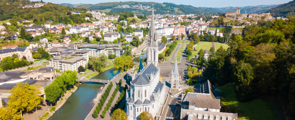 Panoramic view of Lourdes beneath the Pyranees mountains